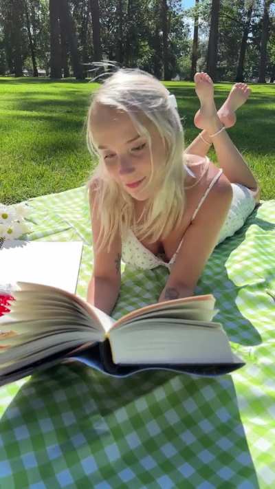 Barefoot + Reading at the park on a beautiful day 🌼🍃