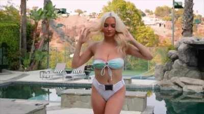 bikinis struggle to contain these huge breasts