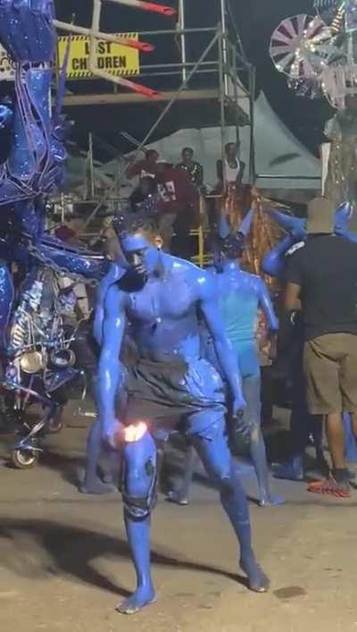 being a fire breathing blue devil for carnival