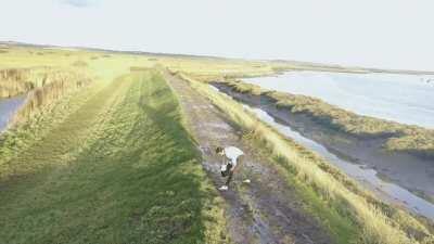 WCGW chasing someone down a muddy pathway