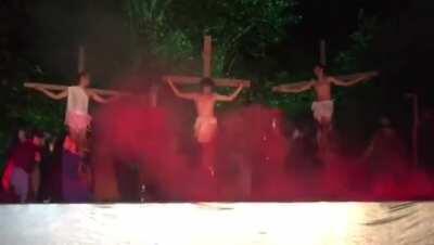 Audience member tries to save Jesus from crucifixion