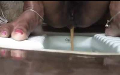 VERY backed up Indian woman unleashes torrents into lucky squat toilet