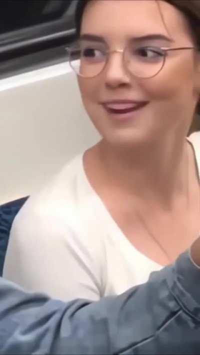 Her hand on his hand.