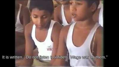 The indoctrination of a young boy. Source unknown.