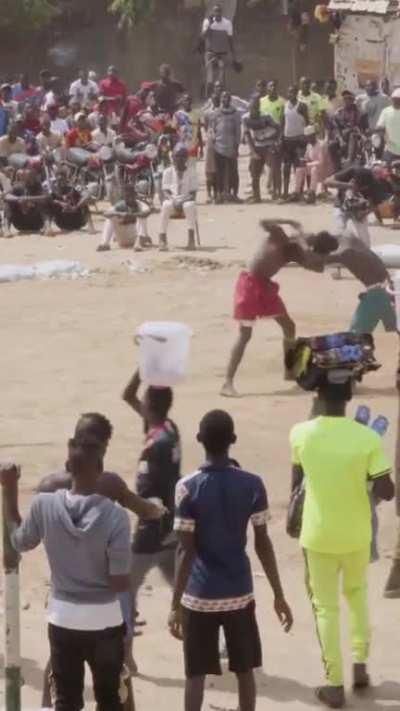 Dambe only allows you to punch with one hand (your “spear”) but head kicks are permitted as well.