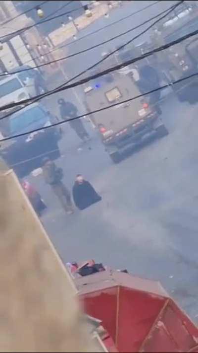 IDF soldier using a palestinian as a humam shield, West Bank