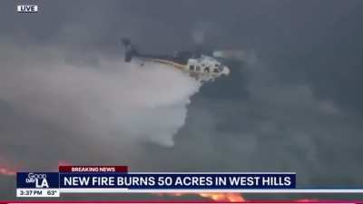 Local news in LA caught this incredibly precise drop on the Kenneth fires