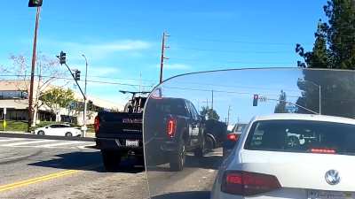 Former Salvage BMW Driver now breaking traffic laws in a Salvage Tesla