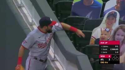 Adam Eaton handing a ball to a 