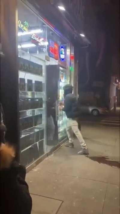 man breaks the glass door while trying to force open it