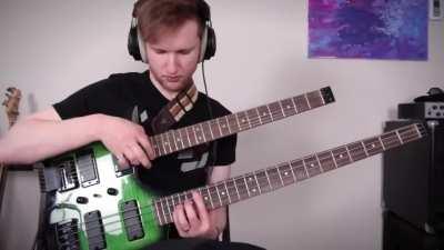 Charles Berthoud playing the guitar and bass at the same time