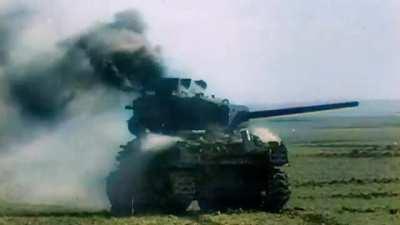 M4A1(76) Sherman 3070707 of the 32nd Armored Regiment 3rd Armored Division burns after being hit by German gunfire near Bergerhausen on March 1st 1945
