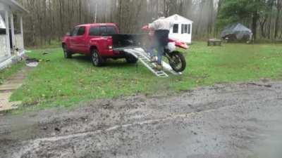 Successfully loading a motorcycle into a truck bed