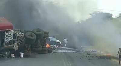 Runaway truck crashes into scene of separate accident and bursts into flames