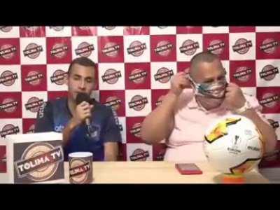 WCGW trying to put on a mask for the first time on live tv