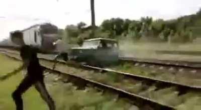 Idiot tried to drive over the railways but got lucky