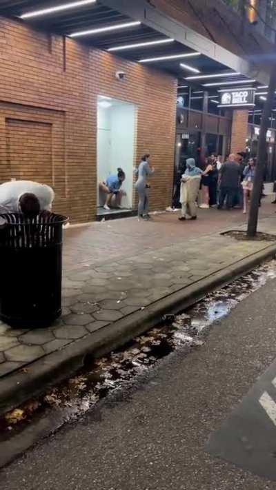 At least she chose a nice dark alley for privacy....