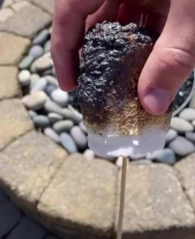 Skinning this burnt marshmallow.