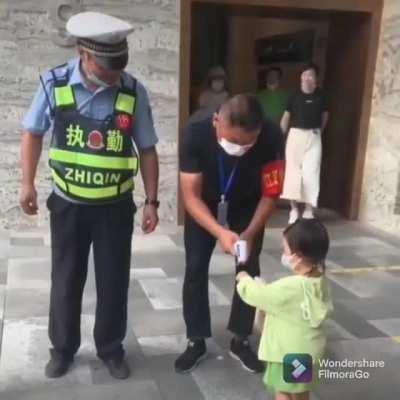This cute little kid asked the officer. 