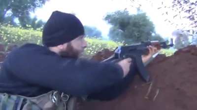 Close call for an FSA fighter caught in MG fire during a lively skirmish with the SAA near Azaz - 2013