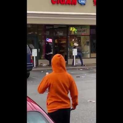 Store Owner Defends Shop from Looters