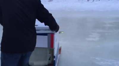 True Winnipegers building out the Seine River rink! Our Zamboni is scrubbing the ice clean. A Canadian DIY.