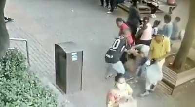 man is beaten after hitting woman in public square in brazil
