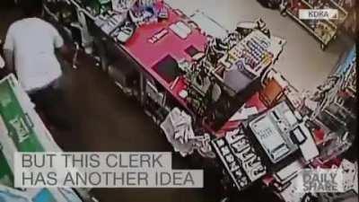 Robber pulls out machete, Clerk pulls out Sword