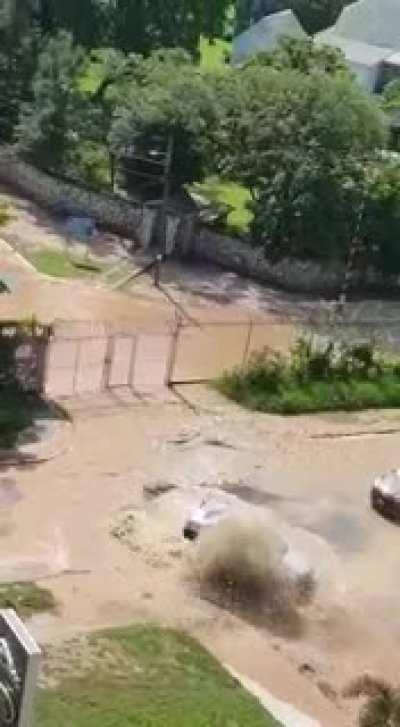 WCGW trying to drive through a flooded street