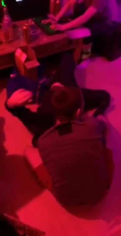 Drunk and sparing on a concrete floor not the best idea unfortunately his back and neck were killing him for a few months afterwards