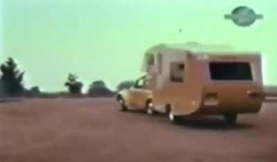 In 1974, owners of Volkswagen Beetles were encouraged to buy this trailer add-on that provided a small living space that can attach to the vehicle.