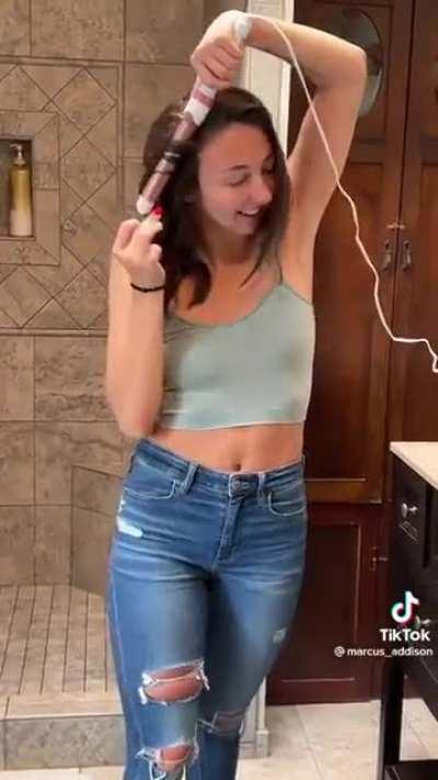 Her jeans are high and tight