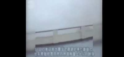 Salvaged video of the Japan 3/11/11 tsunami as it slams into Rikuzentakata. The people that you see running in the beginning all parished inside the Civic Hall which was the building across the street. Only 10 people in the building survived.