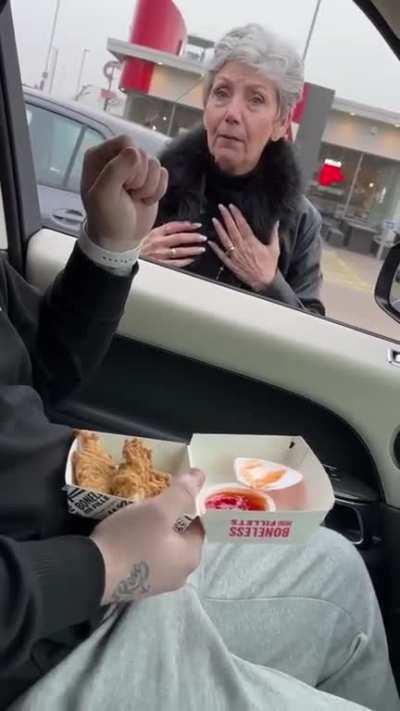 Vegan Activist harasses random people eating KFC, who are eating in their car.