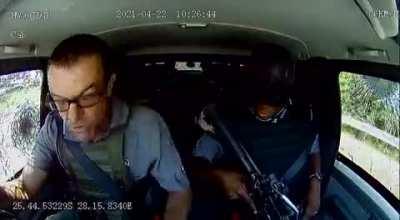 Dodging a cash-in-transit robbery. The man has balls of steel