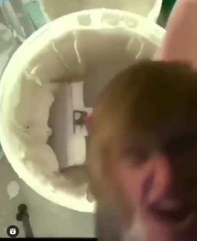 You need a curved putty knife.