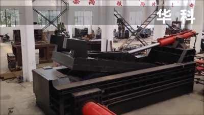 400 ton press makes quick work turning a car body into a cuboid