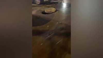 Kid throws firecracker down manhole