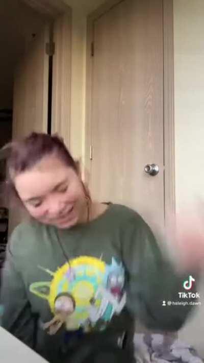 Teenage tiktaka slices her face while recording a tiktok