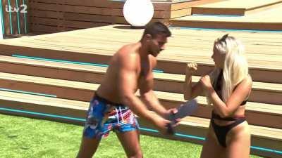 Tommy shows the camera guy what we ALL want to see...