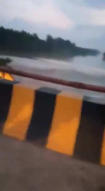 Backhoe loader plunged into river while attempting to demolish century old bridge 2022.