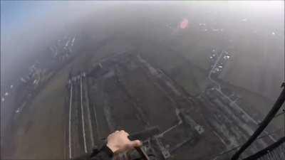 Guy climbs a huge 280 m (919 ft) tall factory tower in Romania