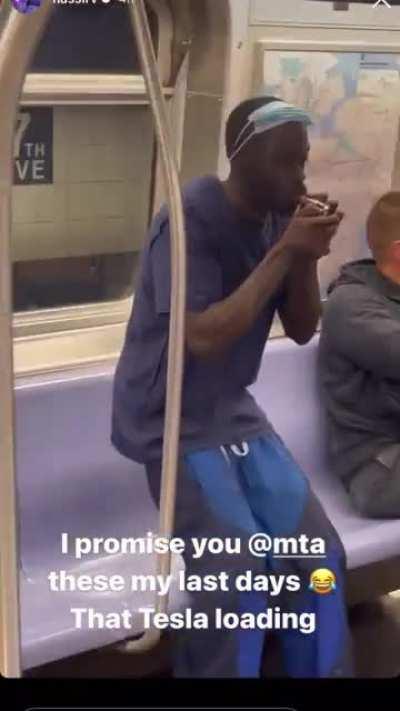 A typical 21st century commute on the NYC subway