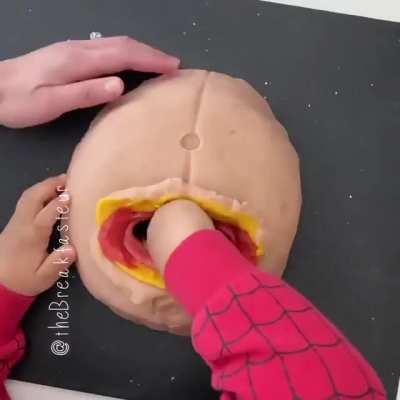 This C-section playdough moulage is well executed, though gifting it for a kid's 4th birthday gift may count as terrible taste.