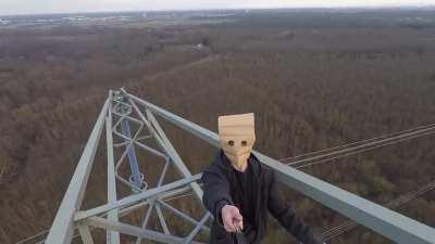 high voltage tower, 300ft above the ground.