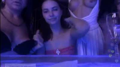 Four girls drinking and flashing party