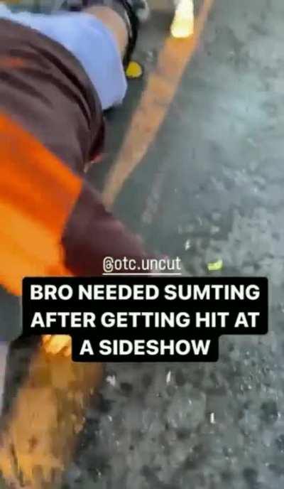 Man pulls out a gun after being struck by a car during a sideshow