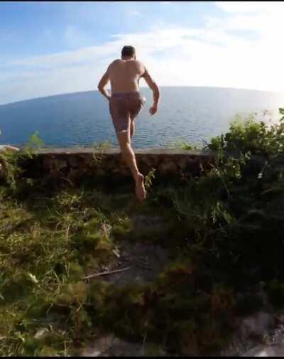 HMRB while I follow my friend off a cliff with a GoPro in my mouth.. via IG @robert.wall @owenweymouthcliffdive