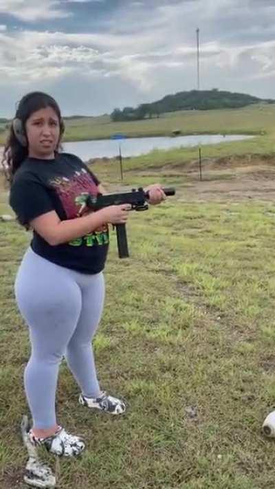 She can't shoot but my God...