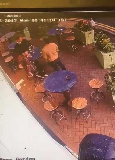 Someone tried to throw a rock through a Beer Garden window